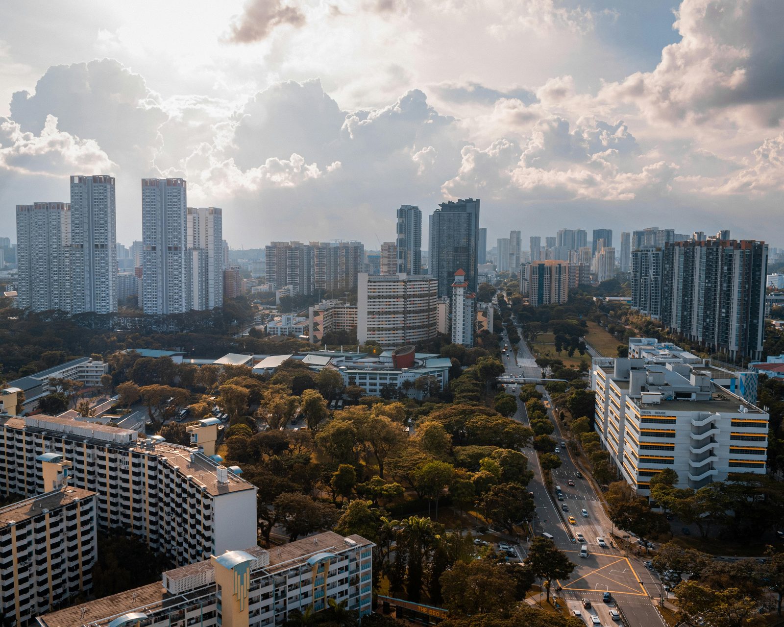 Dense Singapore public housing from above, representing shared portal leads