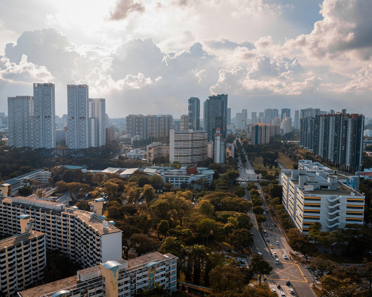 Aerial view of dense Singapore housing, illustrating 36,816 property agents who look identical