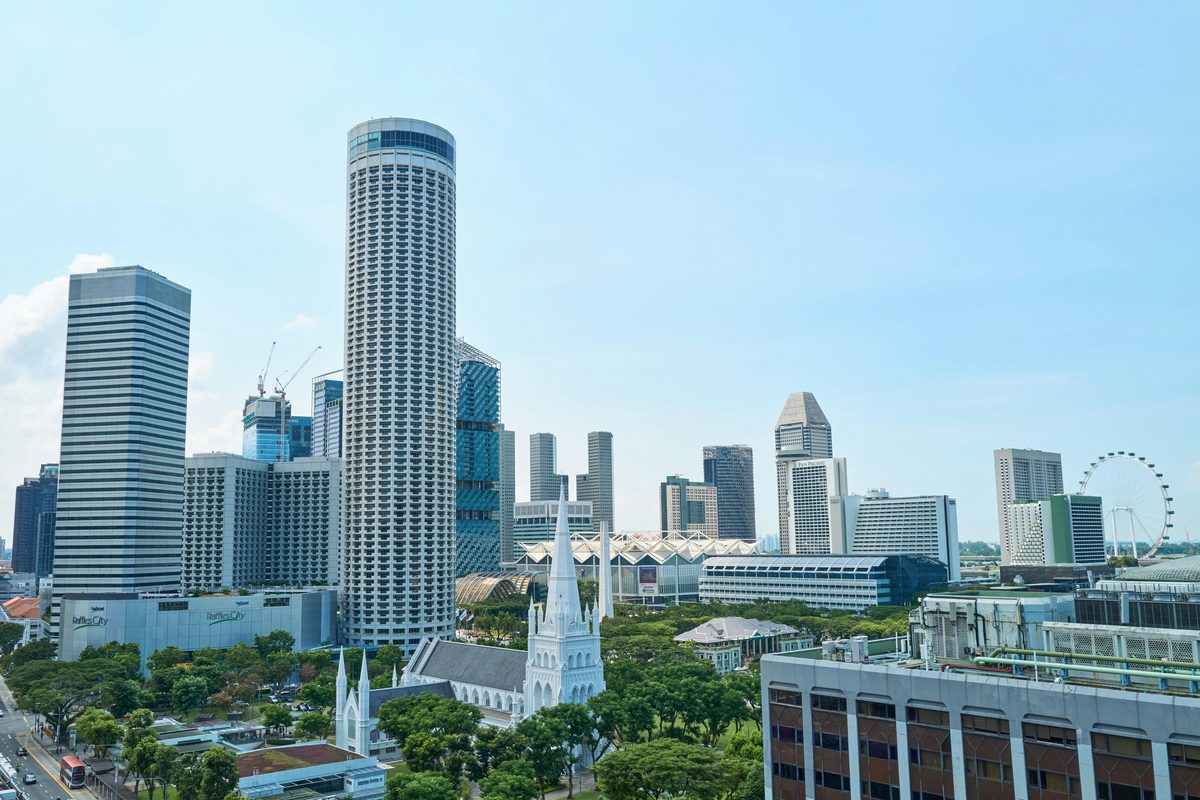 Singapore city skyline with Raffles City, illustrating competitive property Google Ads